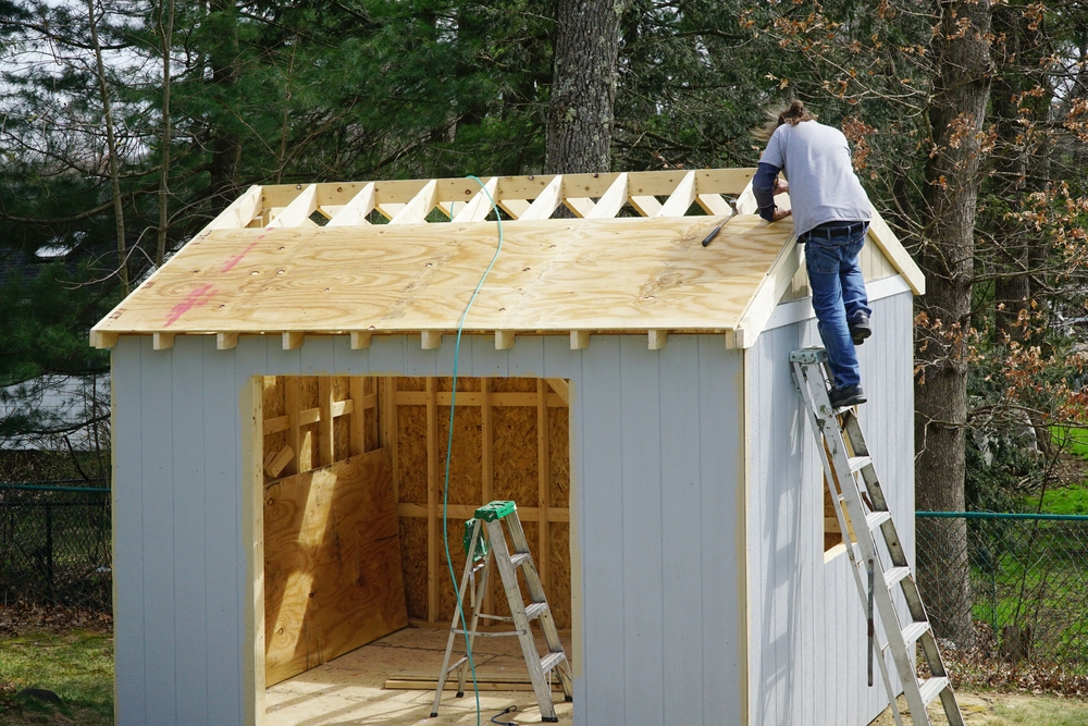 Worker,Building,The,Shed,In,The,Back,Yard