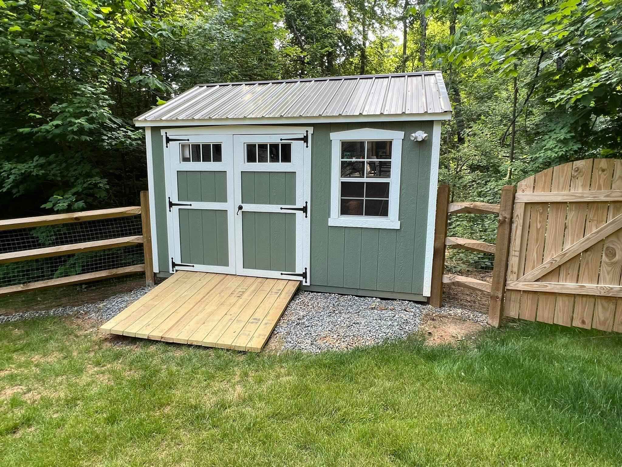10x12 cute by fence