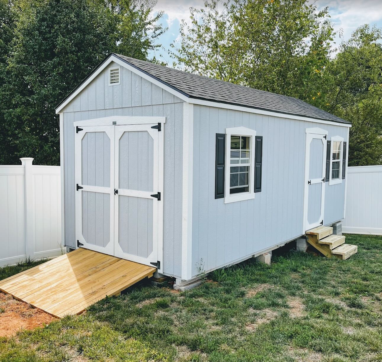attractive shed with ramp and steps
