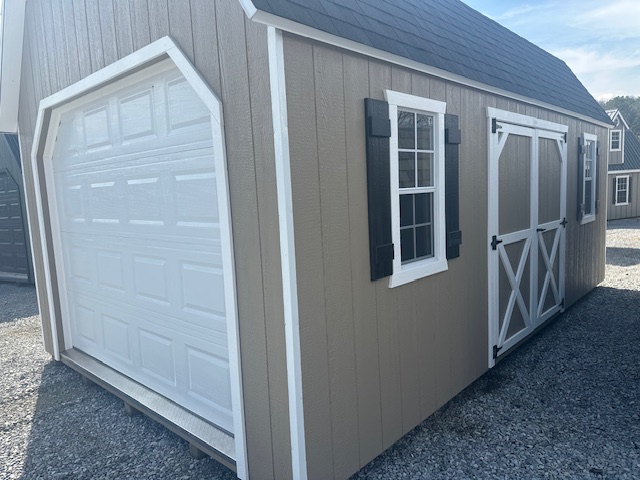 S26002 12x20x7 Classic Barn in Buckskin with White trim.