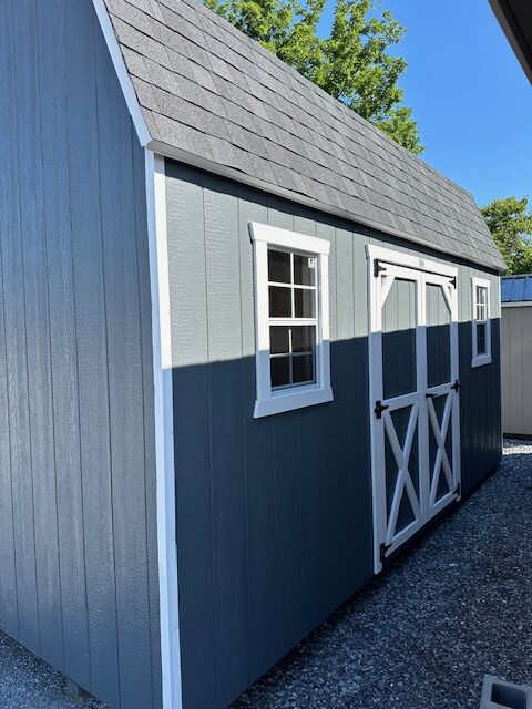 S26027 10x16x7 Barn in Dark Gray with White trim, 5′ Double Door, 2) 18×27 Slide windows, 2) 4′ Lofts