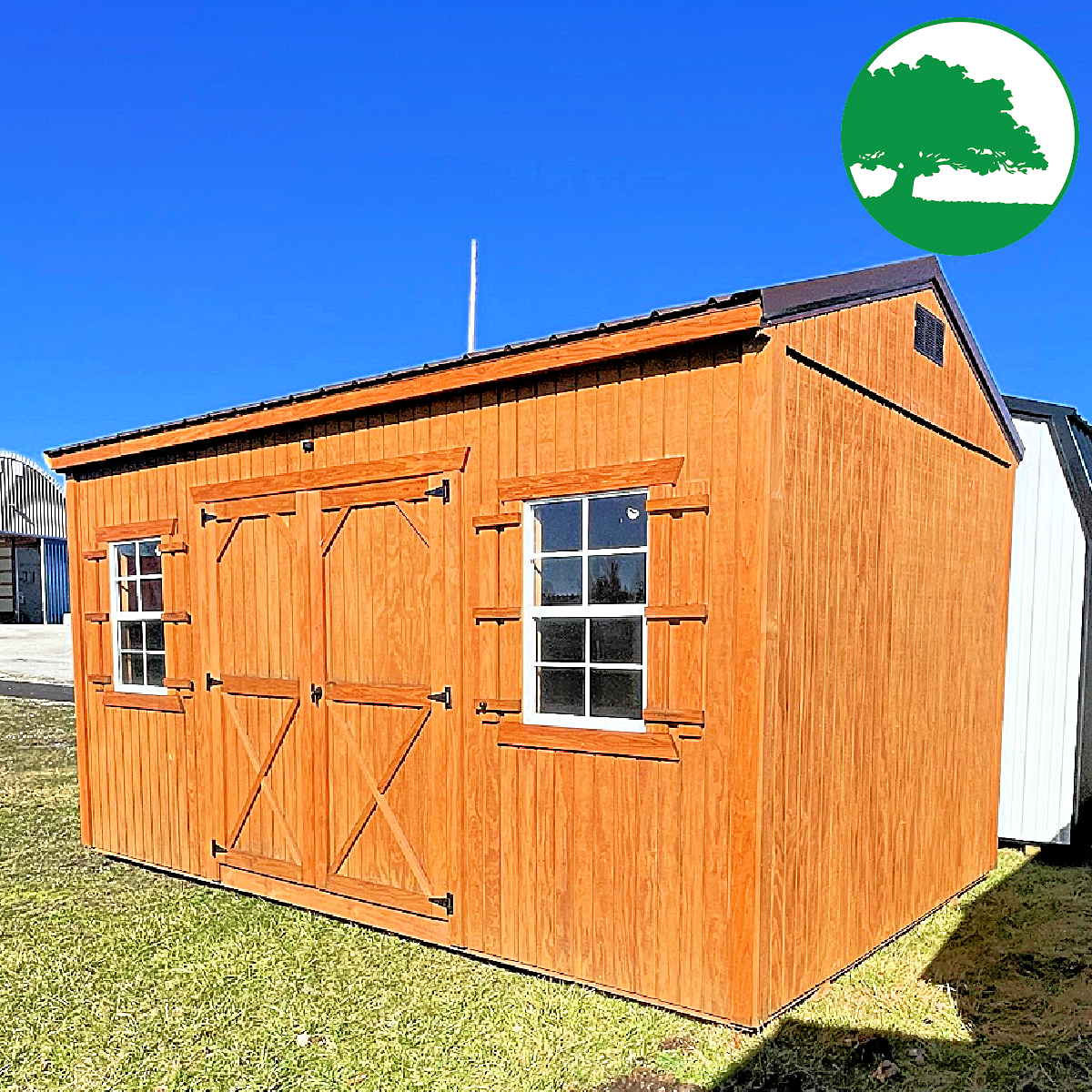 PRE-OWNED 10' x 16' Treated Side Utility