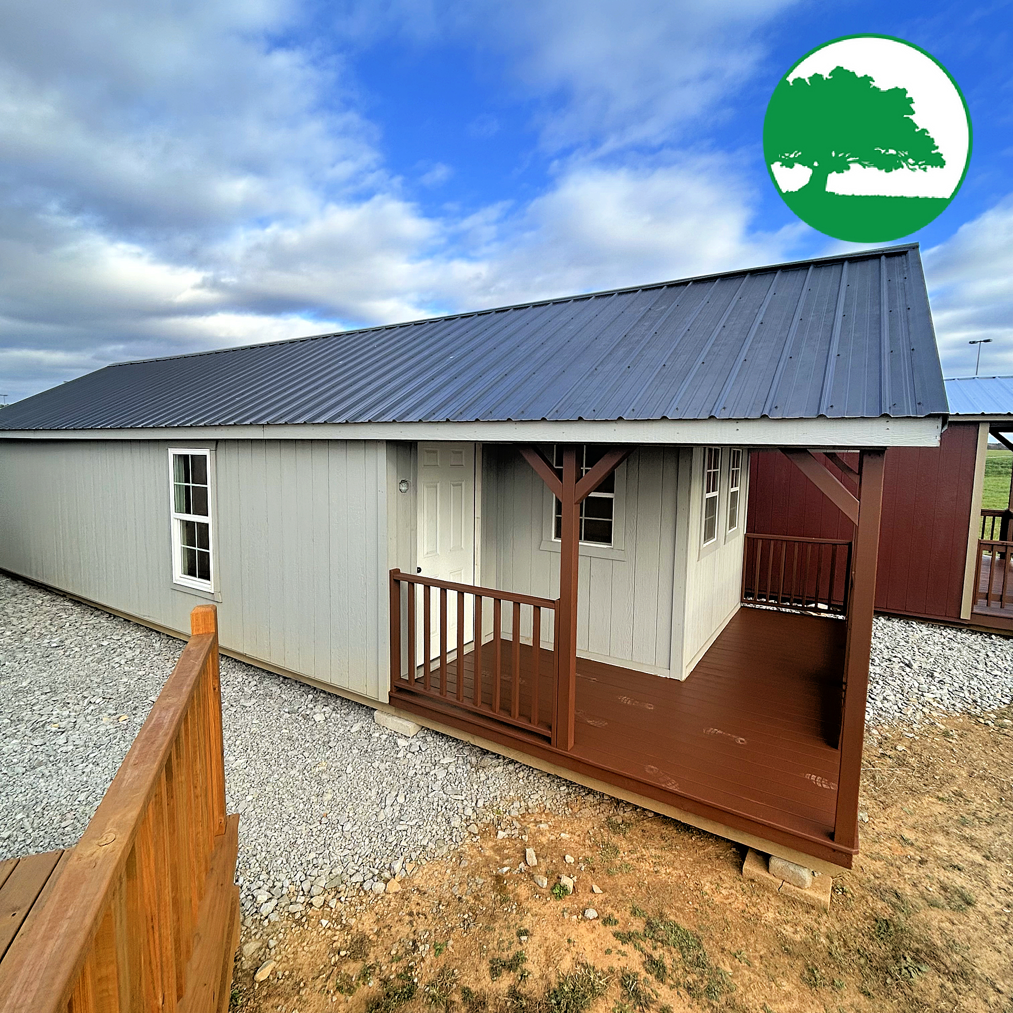 PRE-OWNED 14' x 40' Painted Deluxe Cabin