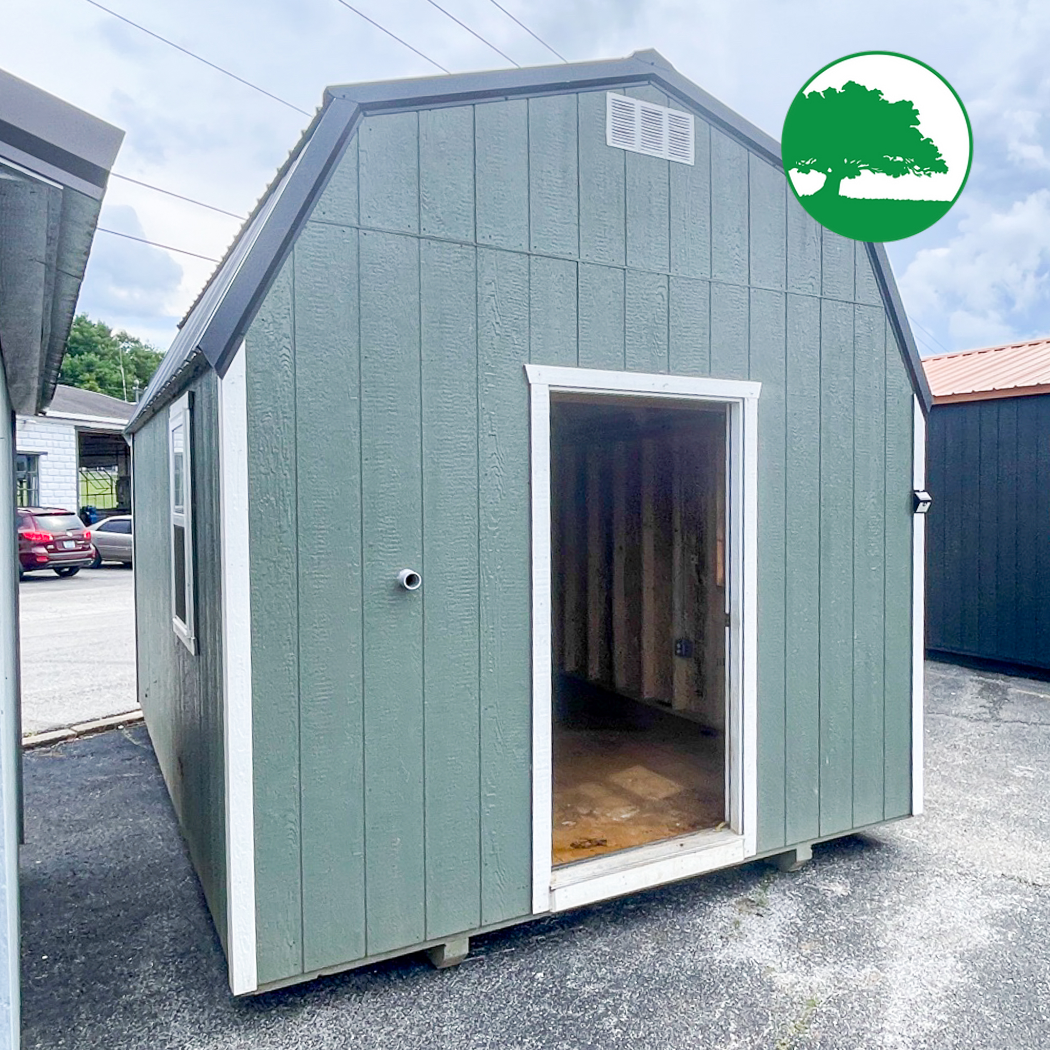 PRE-OWNED 10' x 16' Painted Lofted Barn w/ Electric