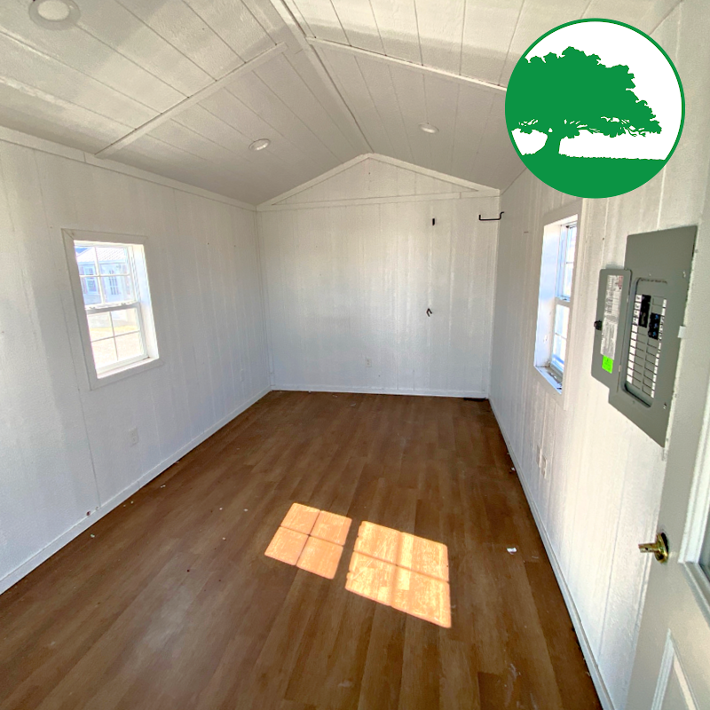 *SOLD*PRE-OWNED 10' x 20' Treated "Cabin w/ Electric"