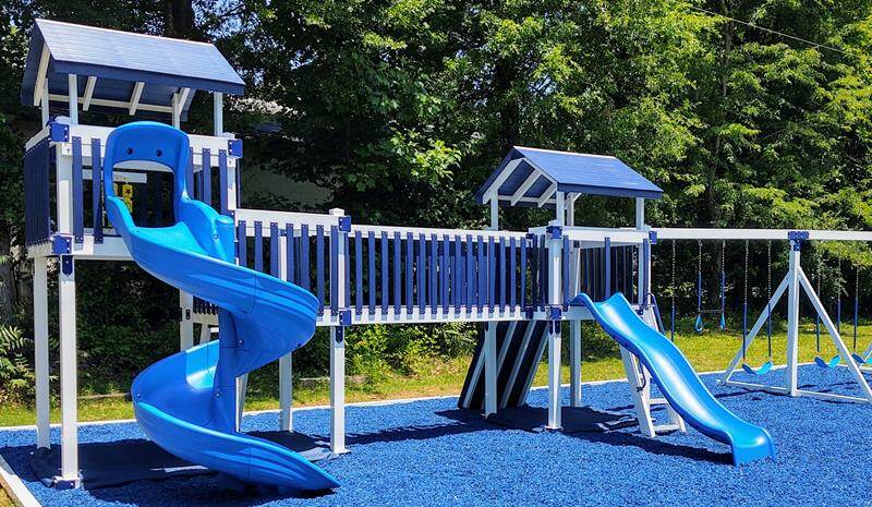 blue rubber mulch and playset