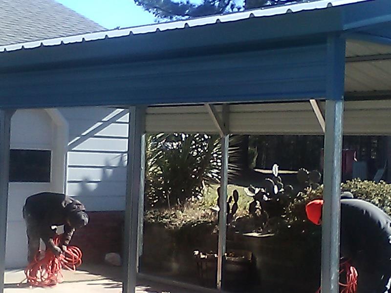 Vertical carport with gables and trimmed half panels