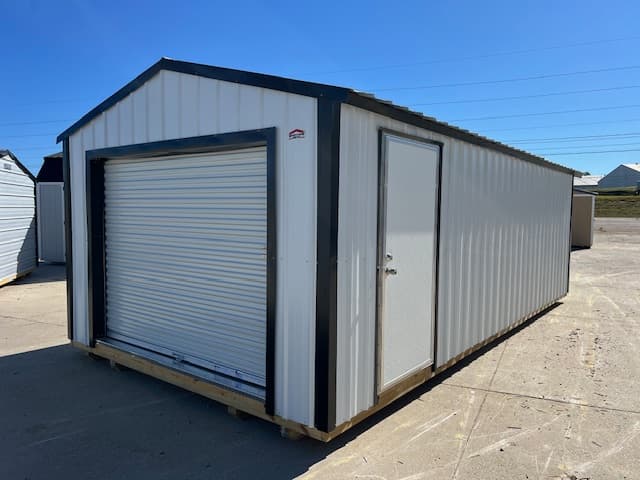 a frame with roll up door shed