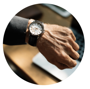 mans hand with a watch on it.