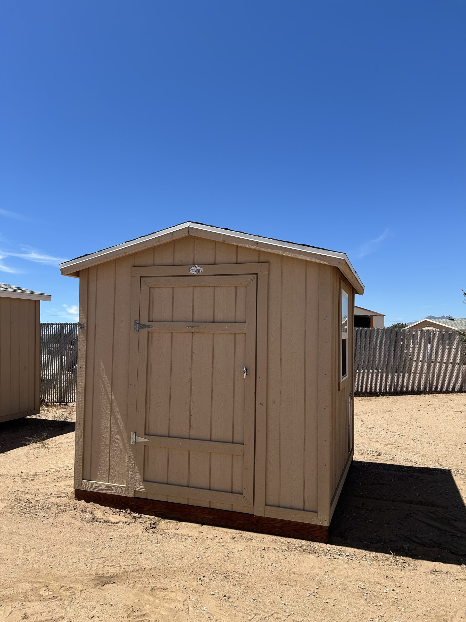 SOLD USED 8x8 Peak 7 With Dog Door and Window STK #2434A