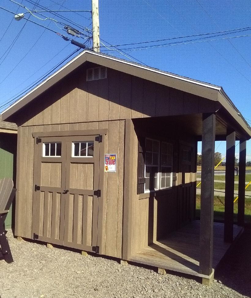 #37 8’x12′ 4ft porch Cabin Display Model