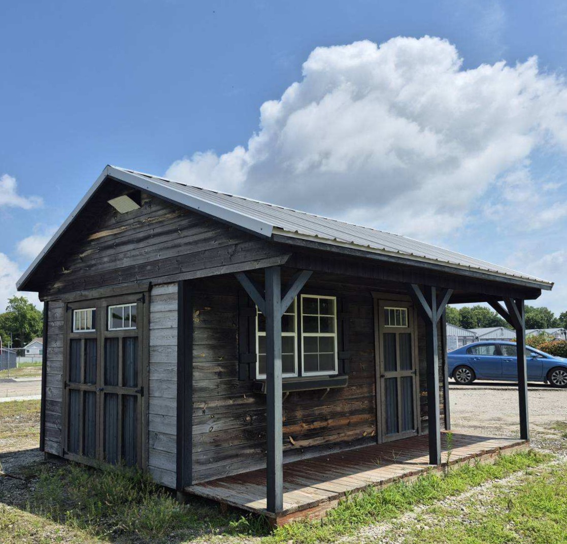 #29b DISPLAY MODEL: 10’x16′ Cabin 4ft porch Pine siding